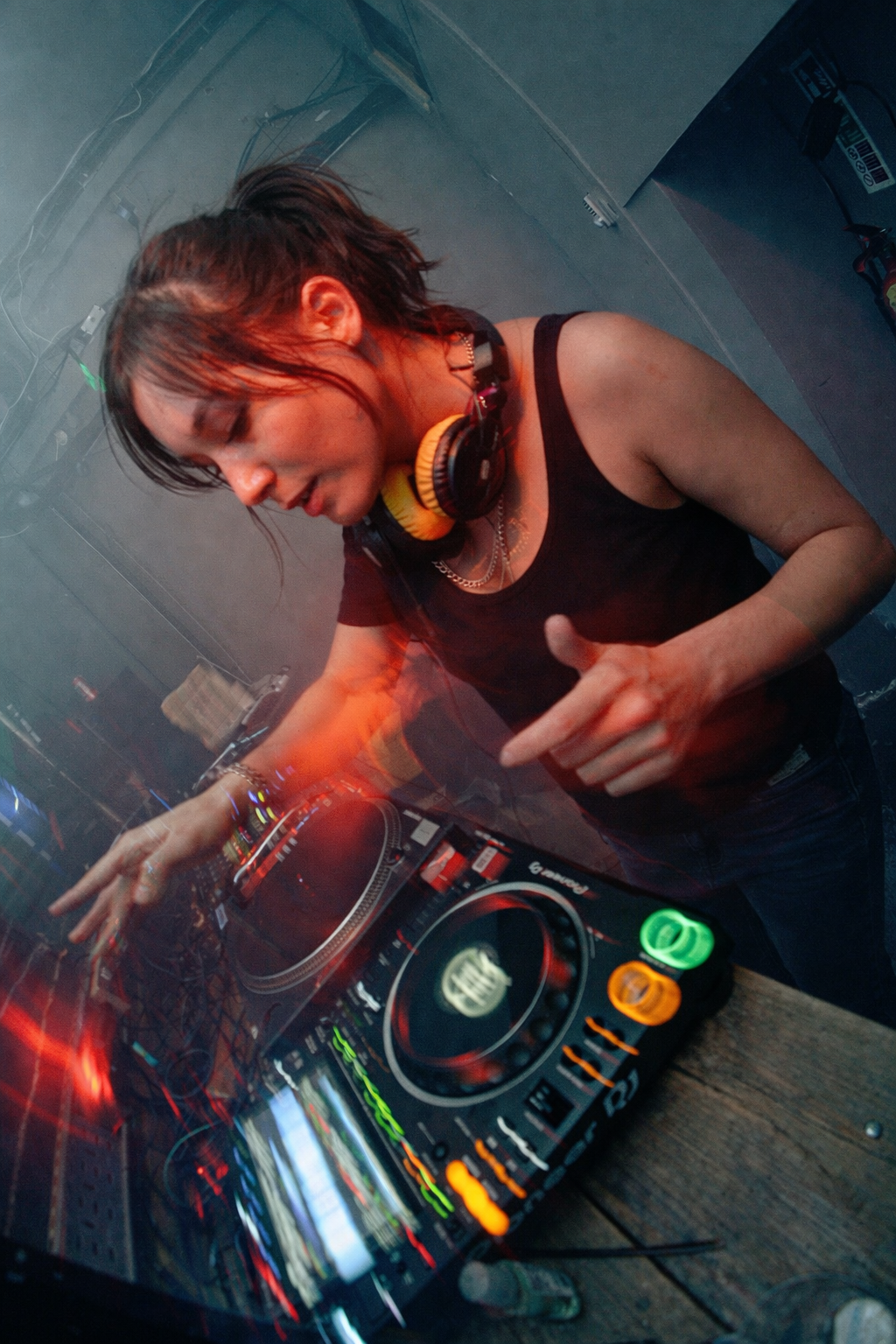 Woman DJing in a venue